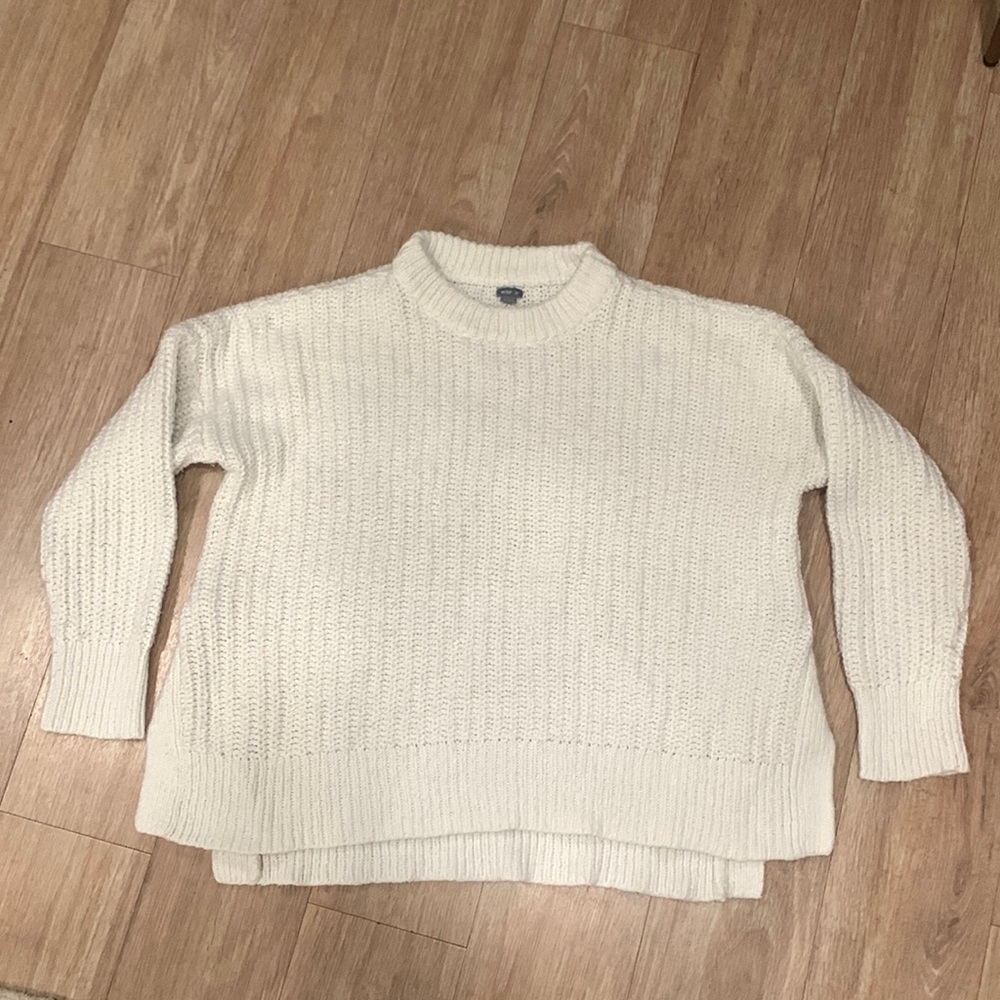White aerie sweater, slits on sides. Small stain shown in last photo.